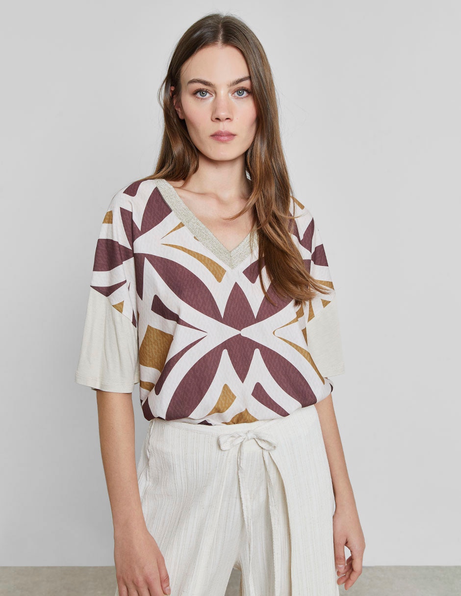 Blusa manga al codo para mujer